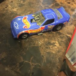 A Blue And Orange Nascar Hot Wheels