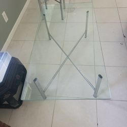 4 glass top tables, 2 coffee, and 2 side tables