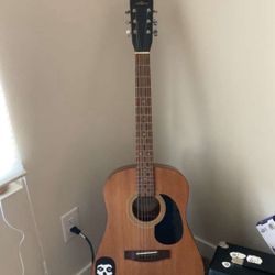 used guitar + hard case 