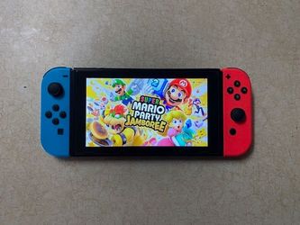 Nintendo Switch with 125 Switch Games MARIO PARTY,MARIO KART,MARIO 3D,POKEMON,ZELDA and Many More