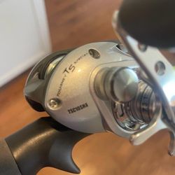Bass pro shop tourney ts special baitcasting reel with 7 ft 1 piece Fishing rod.
