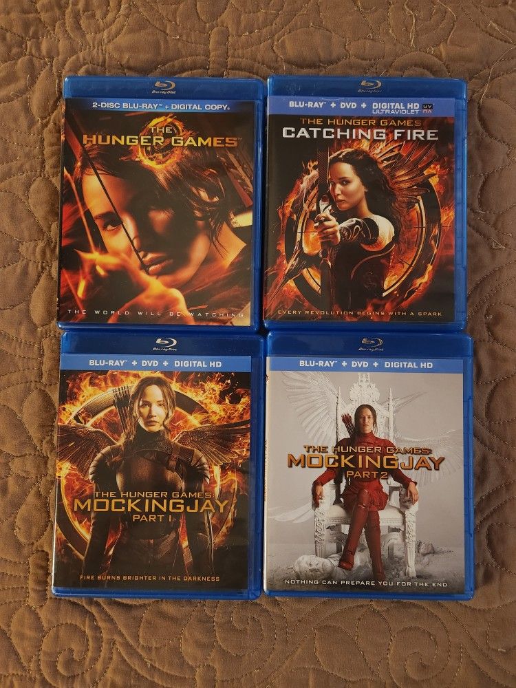 The Hunger Games Quadrilogy Blu Ray/DVD combo Set sold together read description for details all for $$49