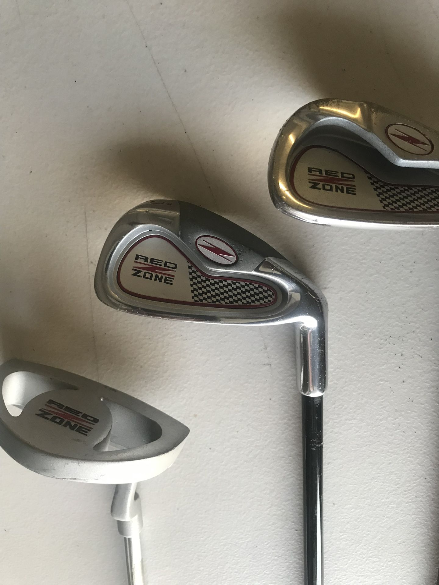 Golf Clubs Red Zone Putter, 5 Iron, Wedge.