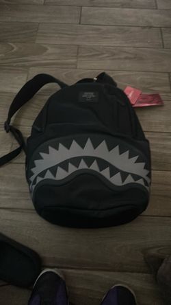 Spray ground backpack