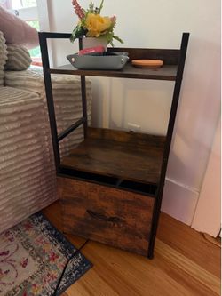 Nightstand with storage basket.