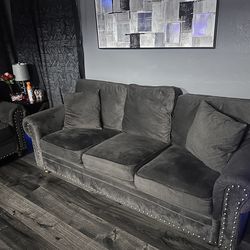 Dark grey velvet sofa