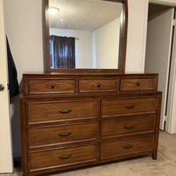 Brown Wood Dresser With Mirror