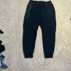 Nike tech pants