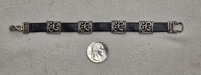 Leather like strap with 4 cast slides bracelet