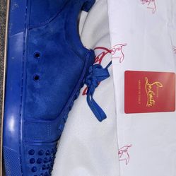 Louis Junior Red bottom Spikes
