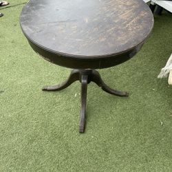 Antique round clawfoot two drawer table hundred dollars