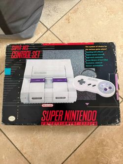 Super Nintendo Entertainment System complete in box + extra controller + Super Mario Kart complete