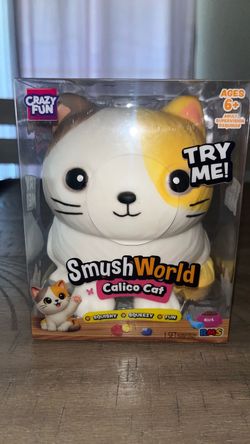Cat squishy toy calico cat smush world squeeze toy