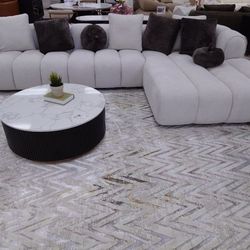 Brand New Gorgeous Channel tufted Right facing sectional upholstered in white fabric w/ accent pillows