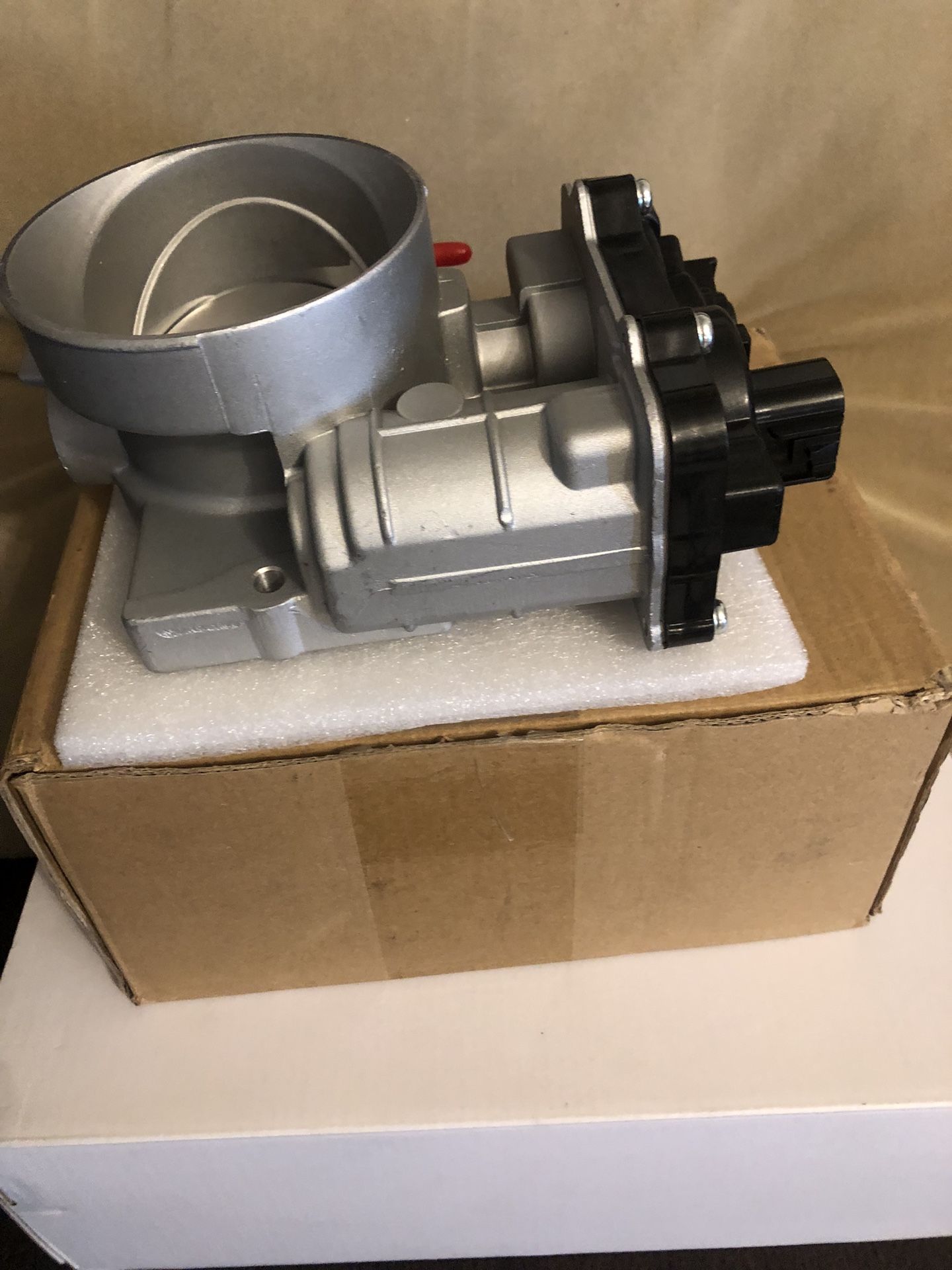 ELECTRIC THROTTLE  BODY # 977–307 NEW IN BOX. 40 FIRM 