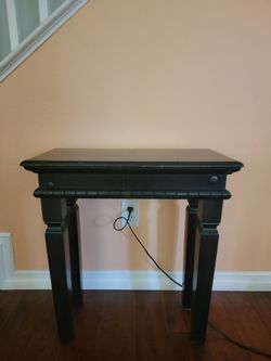 Black wooden side table