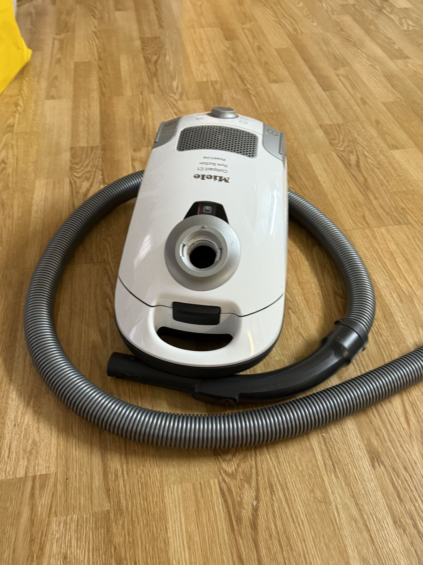 Miele  Vacuum  Compact Cl Pure Suction PowerLime  very good condition  No parts attached   Made in Germany
