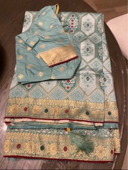 Brand new semi silk saree with stitched blouse