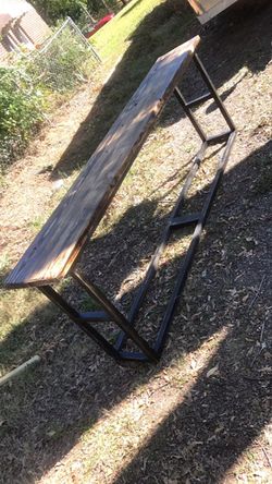 8 foot entryway table! Black distressed bottom with a distressed light brown top!