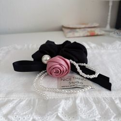 Black color with pink rose and long plastic pearl string scrunchie/hair tie