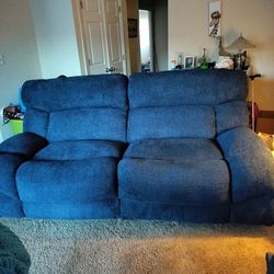 Blue Manual Reclining Sofa. 