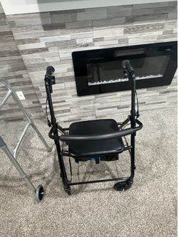 Rollator Walker with Seat & Hand Brakes – Excellent Condition