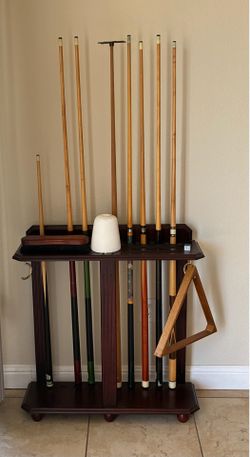 Billiard pool table rack with cues and accessories