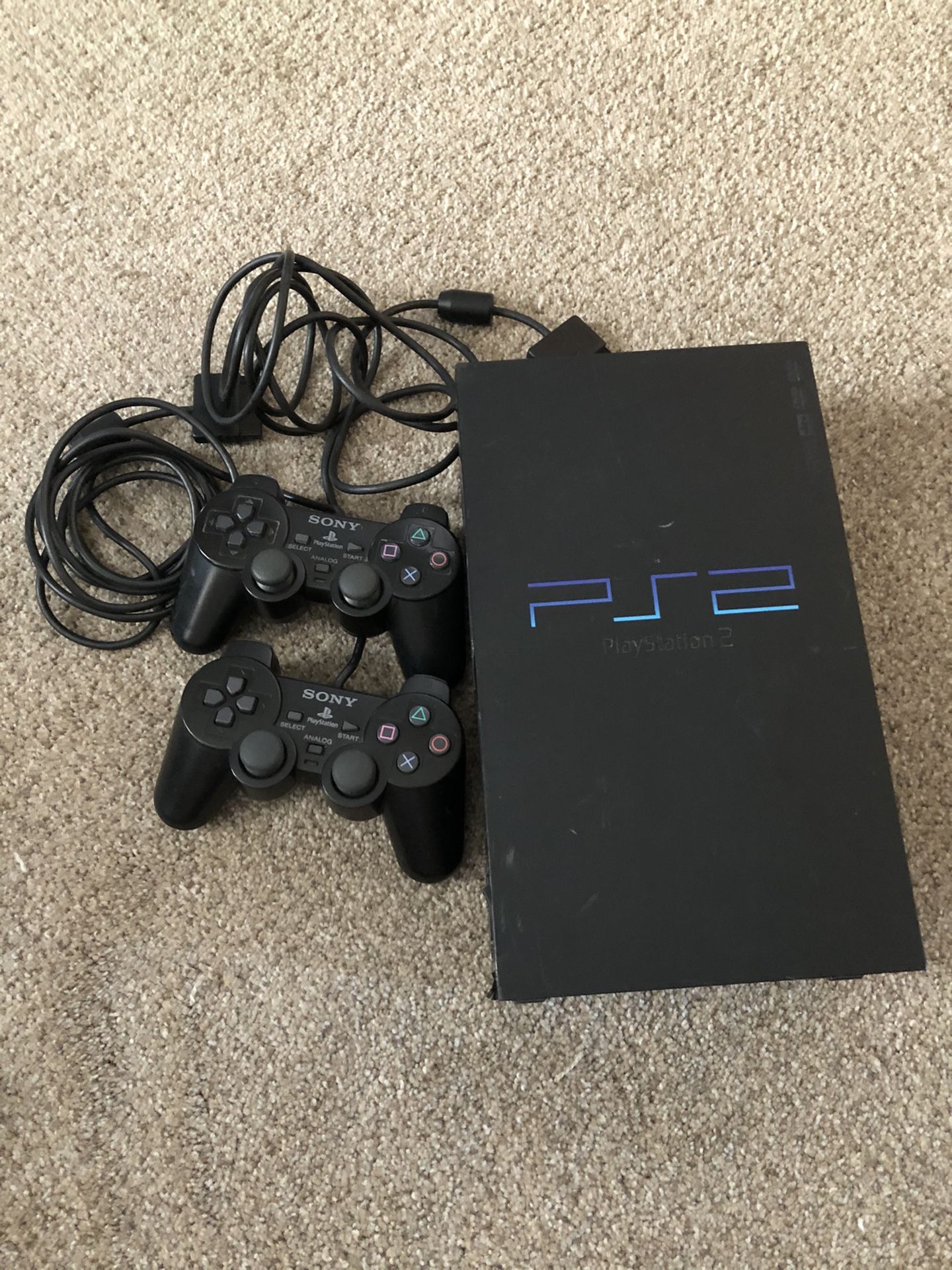 PlayStation 2 w/ controllers