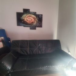 Dilliston Black Leather Couch/Bed