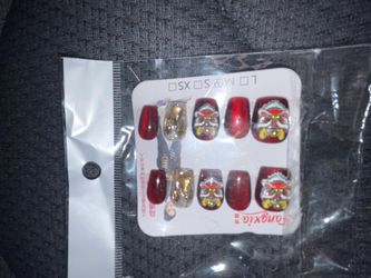 Red nails with designs