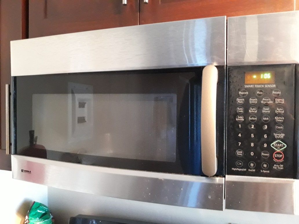 Kenmore stainless steel microwave microhood, broke door