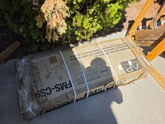 Bench with weights still in box