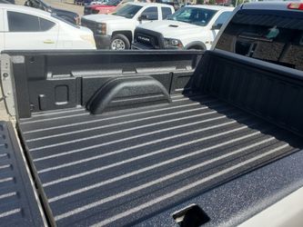 Sprayed in bedliner professional installation lifetime warranty from the manufacturer cheapest prices in the DFW