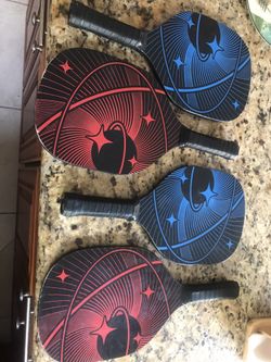 4 Pickleball Racquets 