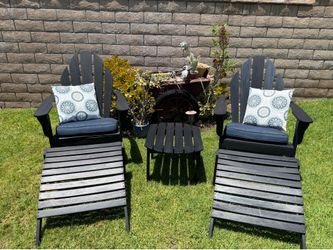 Great condition!!2 Wood Adirondack  chairs, side table and leg rests