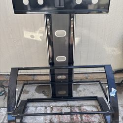 Floating TV stand with glass shelves