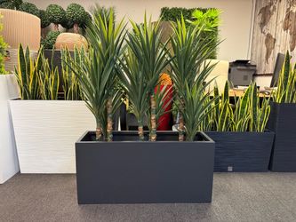 Charcoal fiberglass planter with sisal tree artificial plants