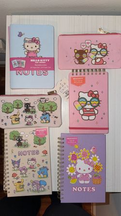 Hello Kitty notebook and pencil pouches
