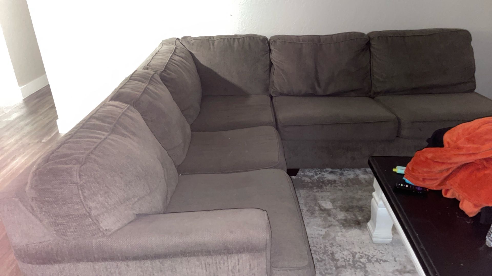 grey L shaped couch