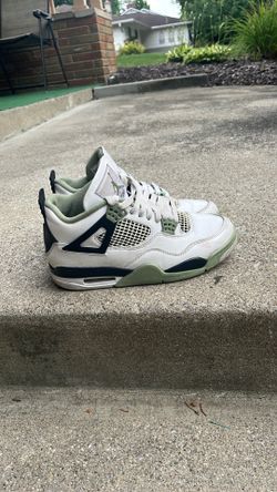 Air Jordan 4s flight olive green ,white ,and black