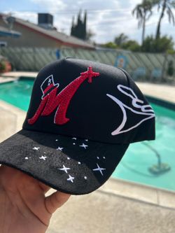 M hat