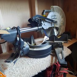 Ryobi  twelve inch sliding compound Miter saw.