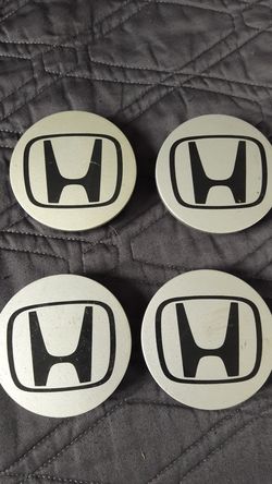 Honda oem wheel caps.