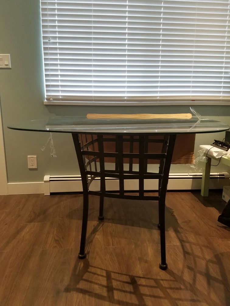 Used glass dining table