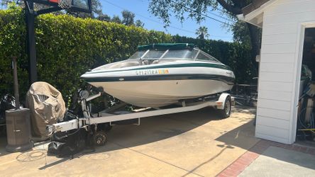 Project boat with trailer.