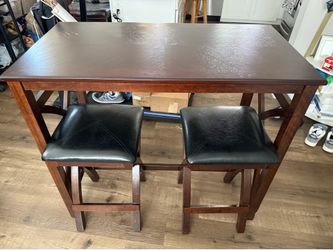 Dining table and bar stools