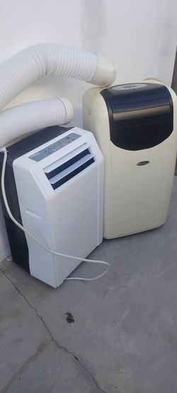 Two Portable Air Conditioners with Exhaust Hoses