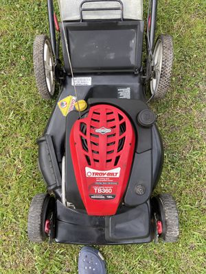 Photo Troy built big wheel lawnmower with 190 ccBriggs & Stratton motor. Runs great no issues asking $140