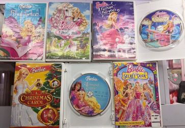 7 Barbie DVD + one extra random Barbie DVD