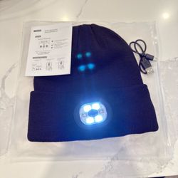 3-in-1 Bluetooth beanie hat with a rechargeable LED light and wireless headphones